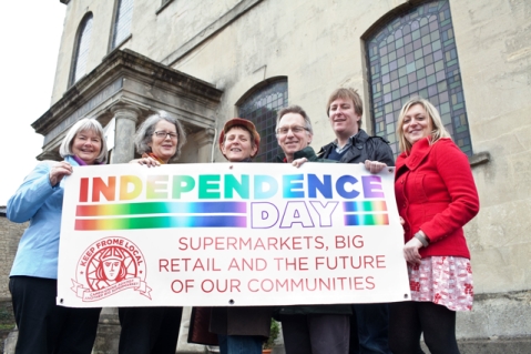 Flying the banner for Independence Day in Frome are (left to right) Janet Weeks, Sheila Gore, Dodie Stephens, Duncan Skene, John Harris, and Jennie Wood. Photo: Tim Gander